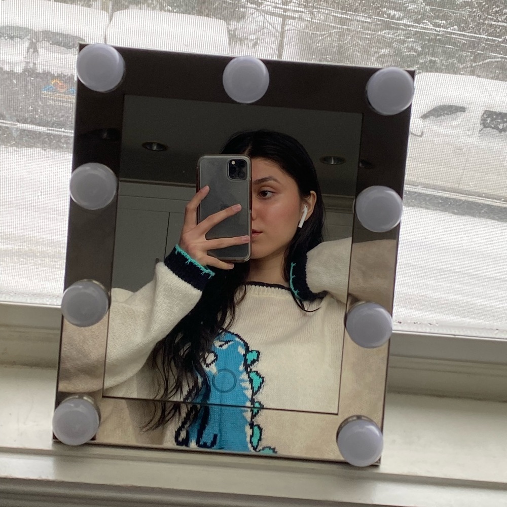 Oversized sweater with a dinosaur print
